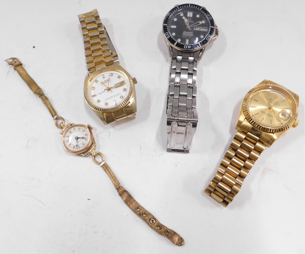 Three gentleman's wristwatches, together with a lady's wristwatch.