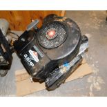 A Briggs and Stratton petrol lawn mower engine.