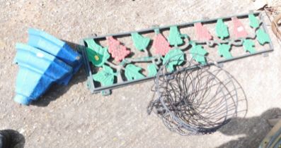 Two blue painted cast iron drain hoppers, together with two wirework hanging baskets, and a painted