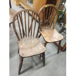 Two oak stick back chairs.