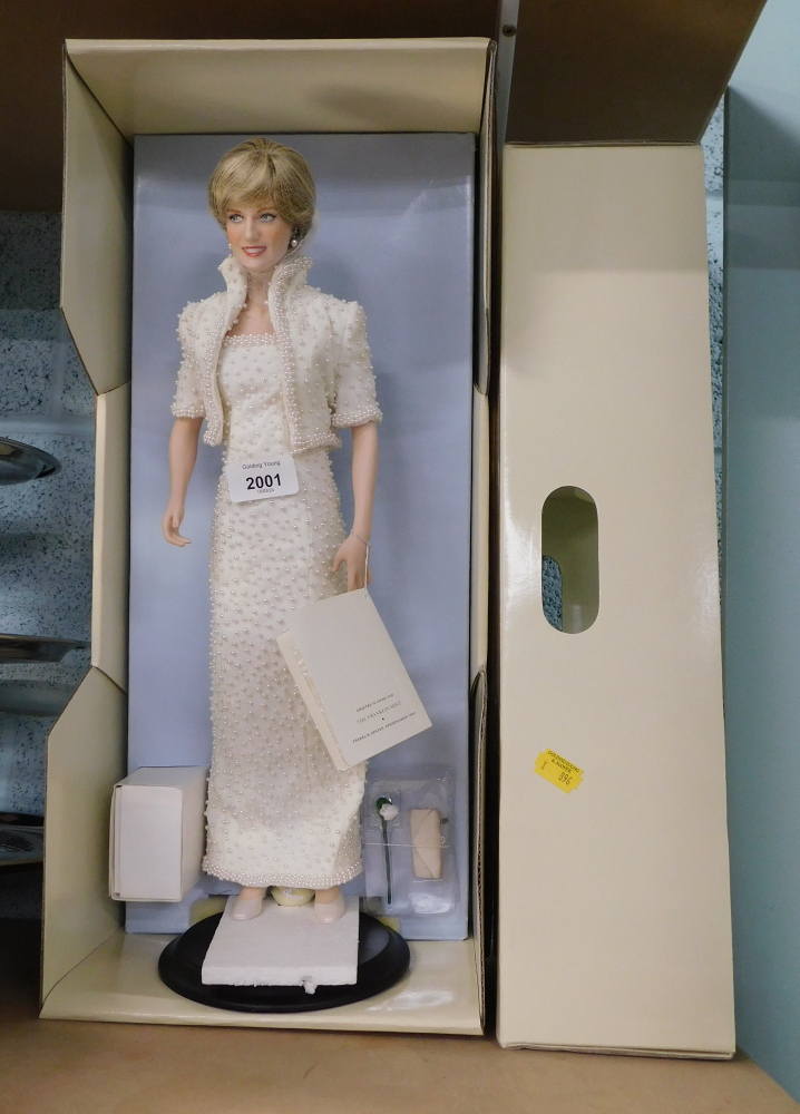 A Franklin Mint matte porcelain figure of Diana Princess of Wales, on stand, 42cm high, boxed.