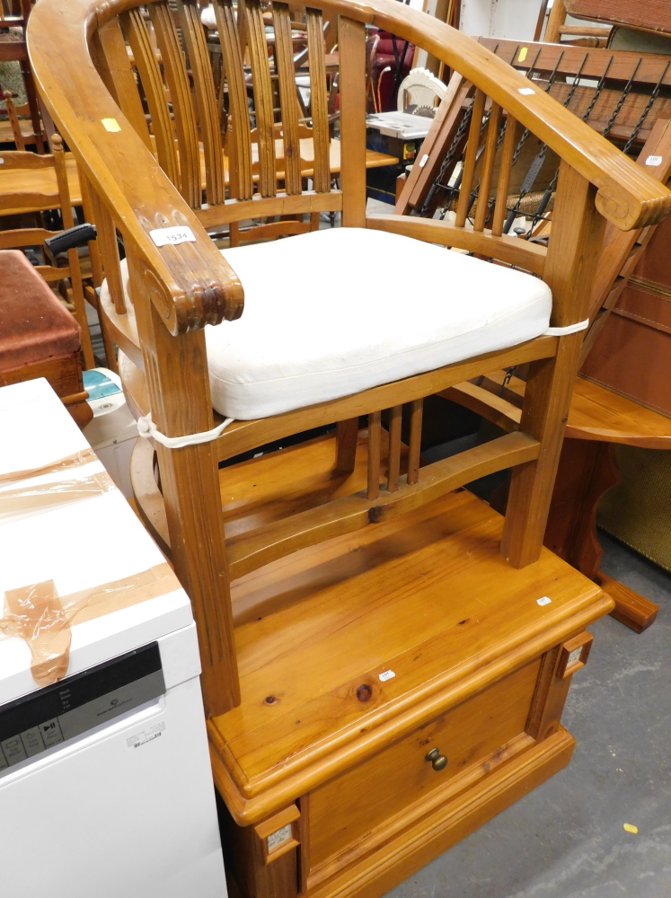 A hardwood open armchair, together with a pine chest with one deep drawer.