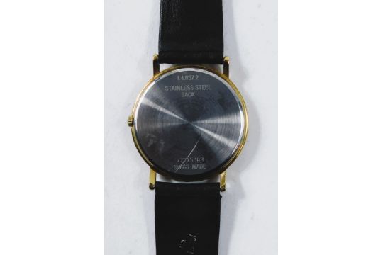 A Longines gentleman's wristwatch, in gold plated case, with white Roman numeric dial, on black stra - Image 3 of 3