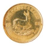 A gold 1/10th krugerrand 1981, 3.4g.