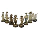 A quantity of Capodimonte composition figures, modelled in the form of children, various signatures,