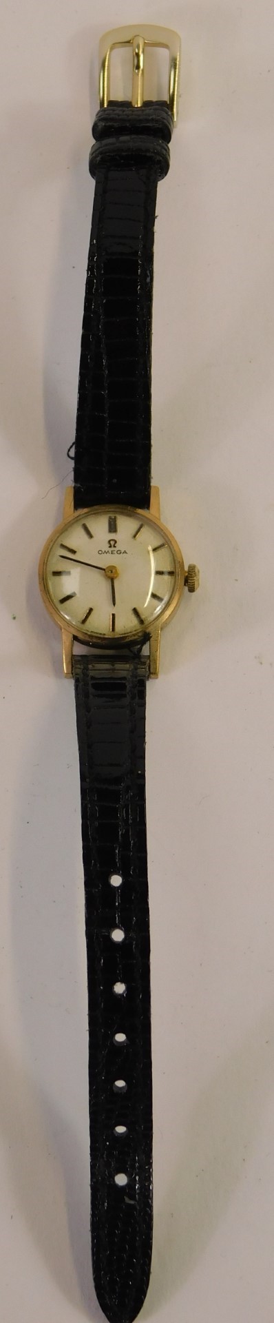 An Omega 9ct gold cased lady's wristwatch, with a silvered batoned dial and black hands, on a - Image 2 of 4