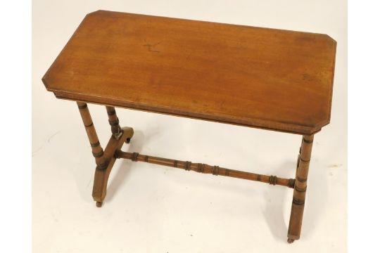 A Victorian mahogany side table, the rectangular top with canted corners, on turned columns and - Image 2 of 2