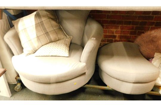 A grey fabric upholstered swivel cuddle chair, 111cm wide, together with footstool.