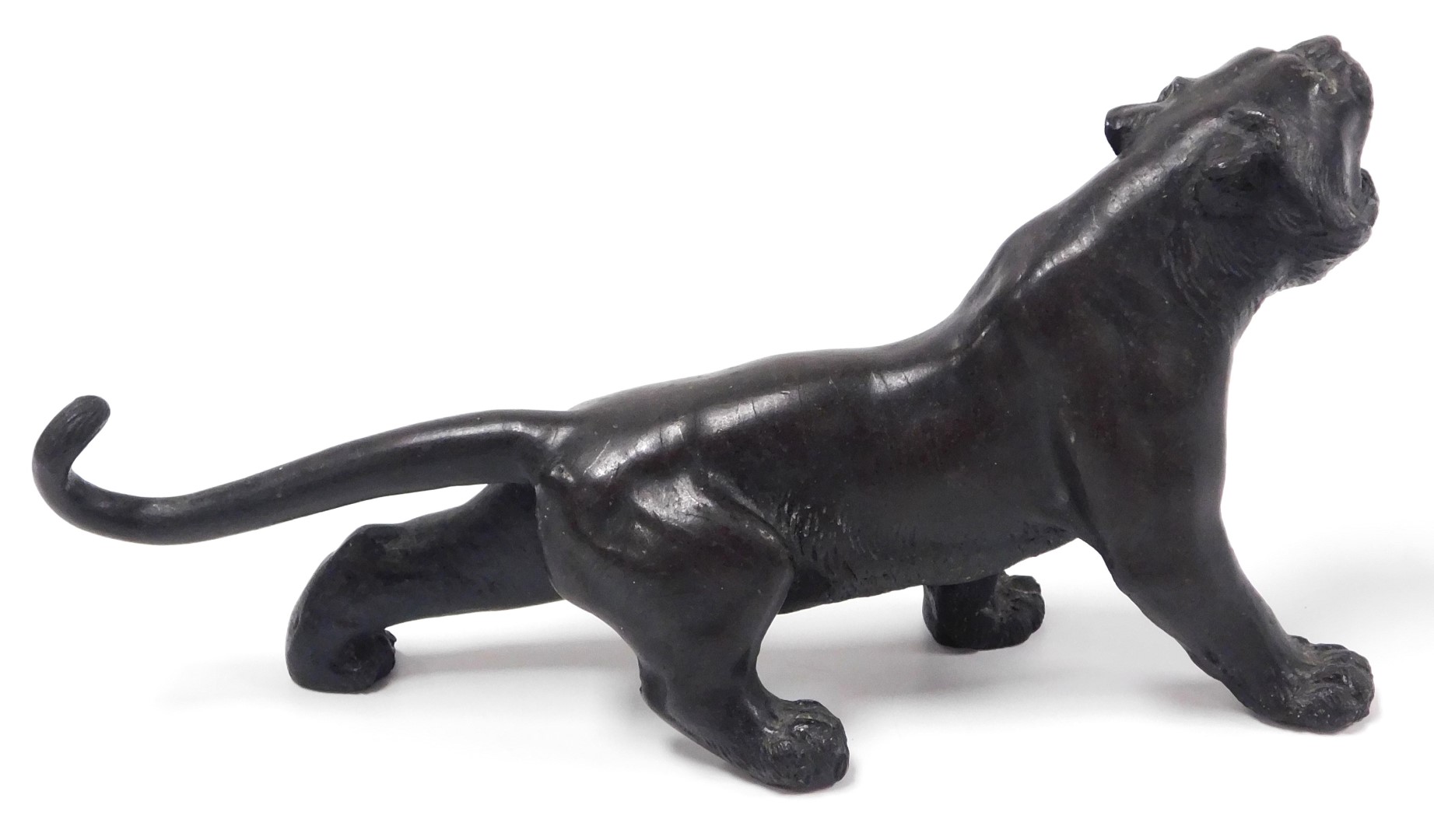 A Meiji period Japanese bronze figure of a snarling tiger, unsigned, 20cm long. - Image 3 of 7