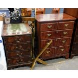 A mahogany two drawer filing cabinet, the top inset with a green tooled leather panel, 78cm high, to