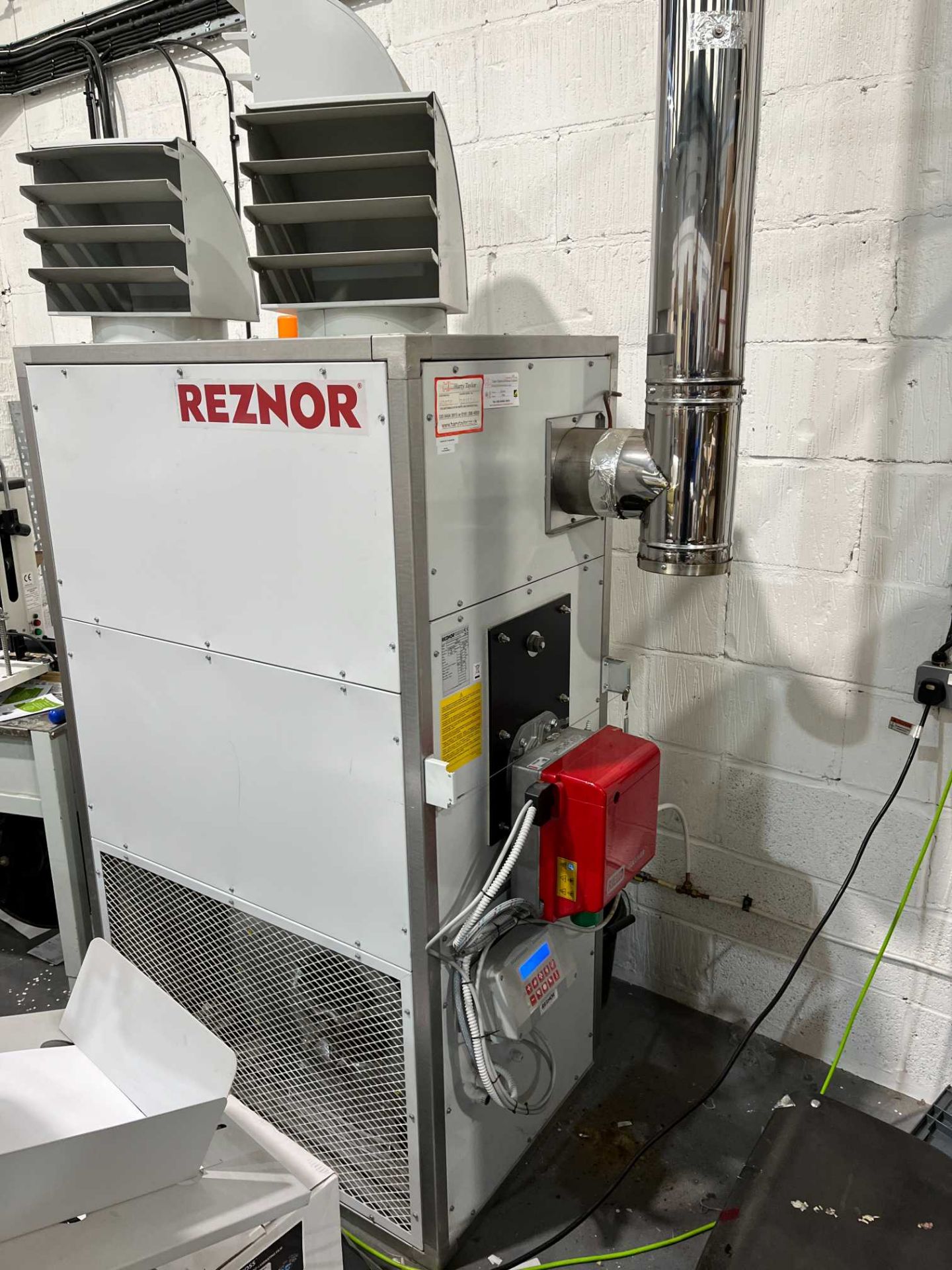 Reznor FSE75 kerosene-fired 70kW warm air heater x 2; Serial Nos 24488013501 (2018) & 24488013493 (