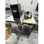 Rapid 106 Electric stapler; Serial No: 104578; on bench-clamp attachment