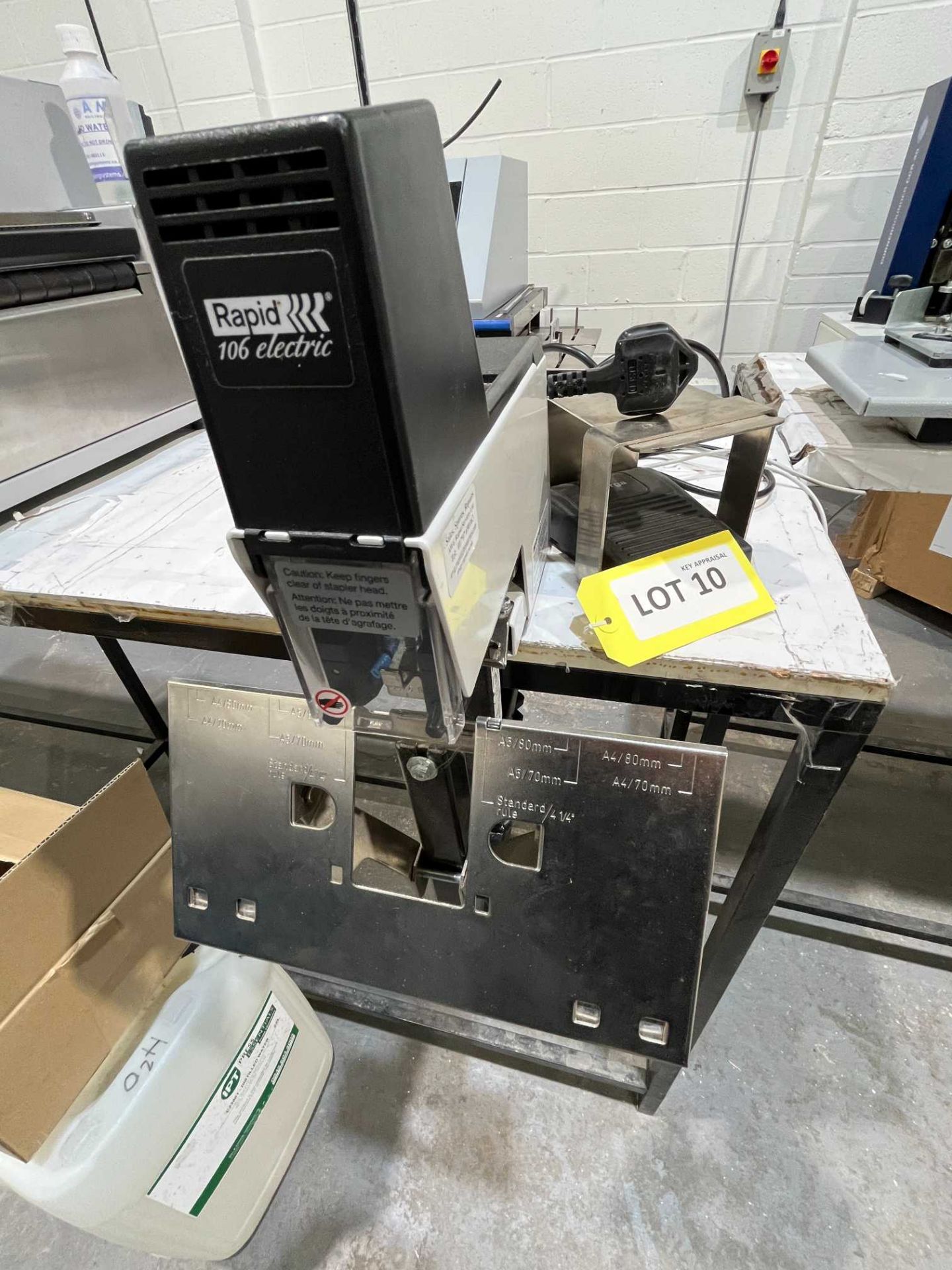 Rapid 106 Electric stapler; Serial No: 104578; on bench-clamp attachment