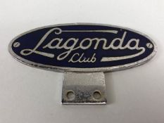 Aston Martin Lagonda , Oval vintage enamel bar badge approximately 125mm across, stamped Gladman and