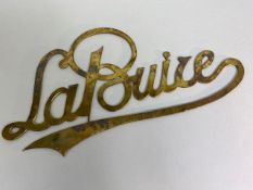 French vintage car name plates, large pre 1938 brass cut out La Buire, approximately 31cm long,