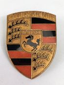 Porsche Motor cars, Vintage Porsche bonnet badge brass with enamel approximately 50 x 70 mm marked
