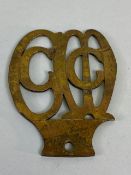 vintage car brass grill plate for C M C C (possibly a car club) in cut out script approximately 7