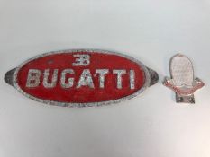 Vintage car items relating to Bugatti, an oval alloy plaque and an Alloy Bugatti owners Club bar