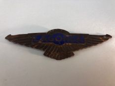 Aston Martin, Lagonda Radiator badge, Bronze wings with blue enamel Lagonda plaque in the center