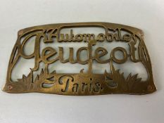 Vintage French car grill plaque in cut out brass for Automobiles Peugeot Paris approximately 12cm