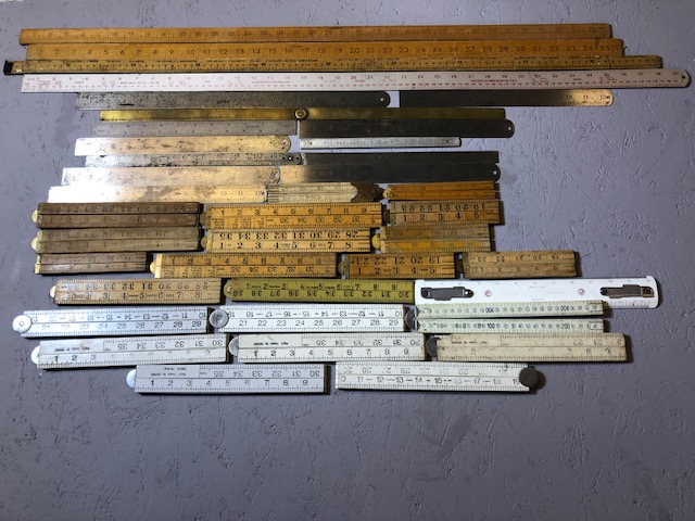 Collection of various vintage rulers