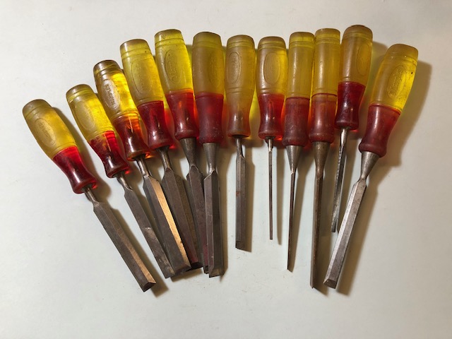 Eleven MARPLES jelly handled chisels