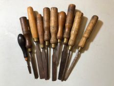 Collection of 10 wooden handled Chisels