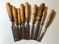 Collection of 9 wooden handled chisels