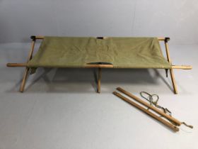 Military interest, 20th century officers folding Campaign style bed, beech wood frame with khaki