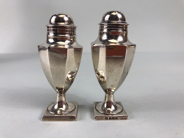 Antique English Hallmarked silver, Two Neo classical urn shaped pounces, each approximately 9cm high