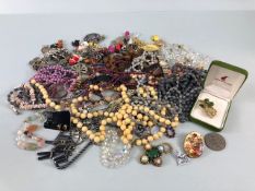 Quantity of costume jewellery to include brooches, watches necklaces etc