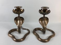 Candle sticks, pair of Indian brass candlesticks fashioned as hooded Cobras the candle holders as