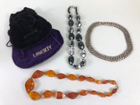 Vintage costume jewellery, Amber bead necklace, 19 shaped Baltic amber beads in Liberty Bag ,and a