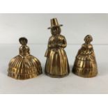 Brass bells, 3 vintage bells in the form of ladies, 2 in crinoline dresses the other in welsh