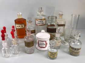 Apothecary Chemist, quantity of vintage glass chemist bottles and jars some with labels, 18 items in