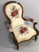 Antique furniture, 19th century padded hoop back armchair, carved walnut frame with brass casters,
