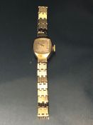 9ct Gold watch by maker Renown on a 9ct Gold watch strap of five bar design (total weight approx