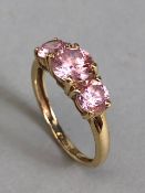 14ct Gold ring three stone pink gemstones size 'M'