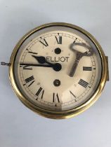 Ships Clock, a vintage steel and brass Marine clock by Elliot, side winding black painted case,