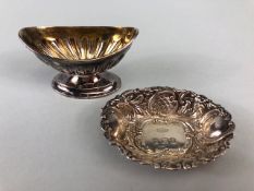 Two hallmarked silver salts one on a pedestal base with gold gilt interior the other on a flat