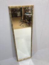 Decorative Mirror, modern long dressing mirror with bevelled edge in gilt leaf pattern frame,