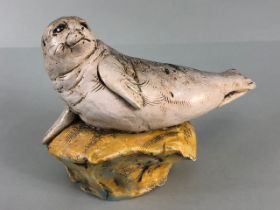 Studio Art pottery, study of a seal pup on a rock signed D.C 2017 No2 to edge of base