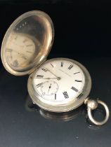 Silver hallmarked full hunter pocket watch, white face with roman numerals and subsidiary minute