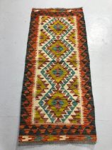 Oriental Carpet ,wool Hand Knotted Chobi Kilim colourful Geometric designs approximately 148 x 67cm