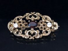 9ct Gold pierced brooch set with gemstones of a Victorian style approx 35mm x 20mm & 4.4g