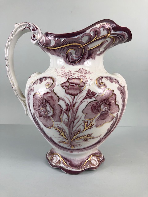 Decorative China, large Victorian water jug decorated with magenta flowers on a white background and
