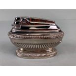 Silver Plated Ronson Table Lighter of classical urn design , stamped to base with reg design marks
