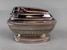 Silver Plated Ronson Table Lighter of classical urn design , stamped to base with reg design marks