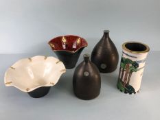 Art pottery, ceramics, a collection of modern designed an decorated ceramics to include a cylinder