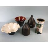 Art pottery, ceramics, a collection of modern designed an decorated ceramics to include a cylinder